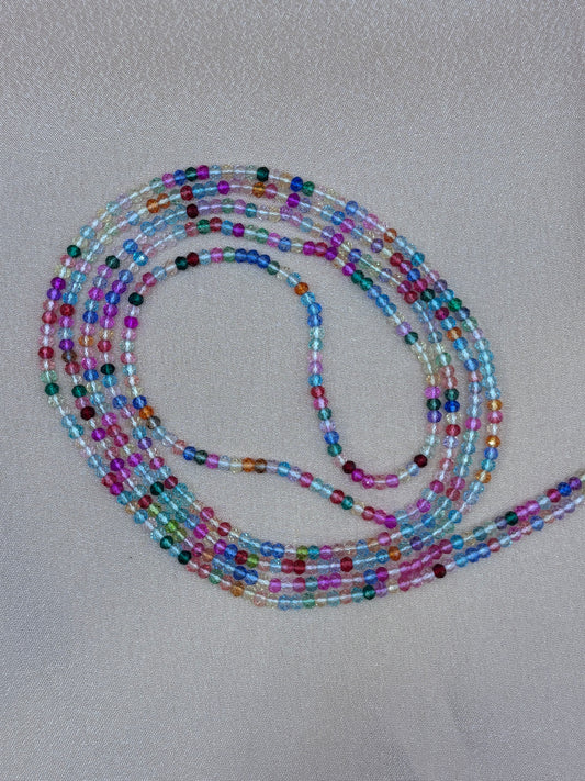 Crushed Ice handcrafted waist beads featuring a vibrant multi-colored mix of shimmering jewel-toned crystal rondelles glass beads by Beadiful Adornments.